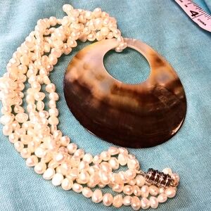 6.10.24 faux fresh water pearls and shell pendent